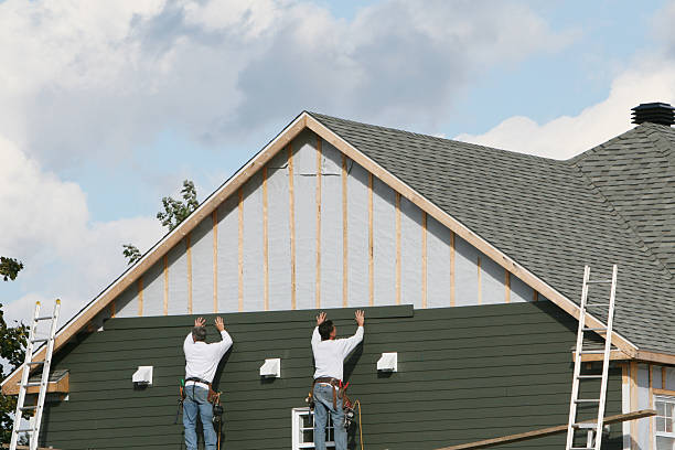 Professional Siding Contractor technician working in Clarksville, TN